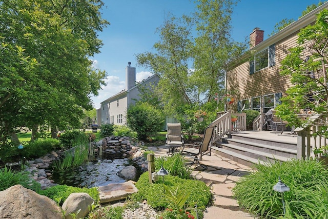 305 Buckingham Dr, Algonquin, IL 60102 - view of yard with a deck, a patio area, and a small pond