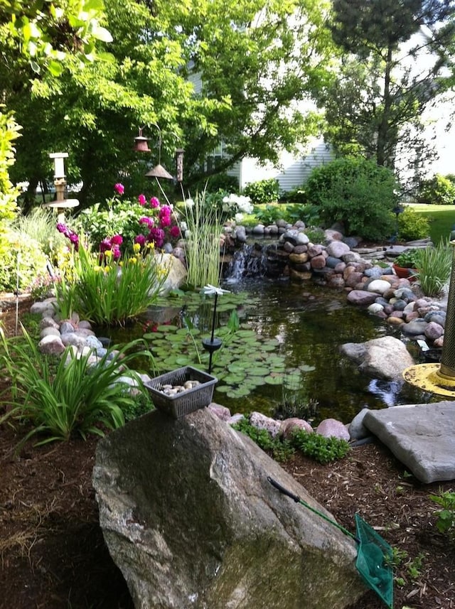 305 Buckingham Dr, Algonquin, IL 60102 - view of yard featuring a garden pond