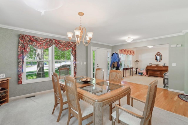 305 Buckingham Dr, Algonquin, IL 60102 - dining area with a chandelier and crown molding