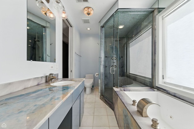 4736 N Lincoln Ave Unit 4, Chicago, IL 60625 - bathroom with vanity, a shower stall, and a jetted tub