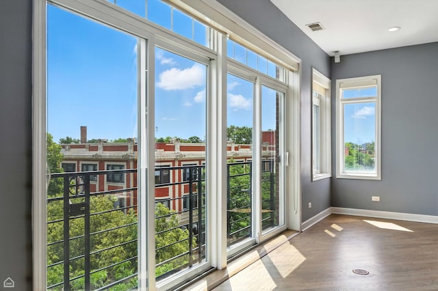 4736 N Lincoln Ave Unit 4, Chicago, IL 60625 - doorway featuring plenty of natural light and wood finished floors