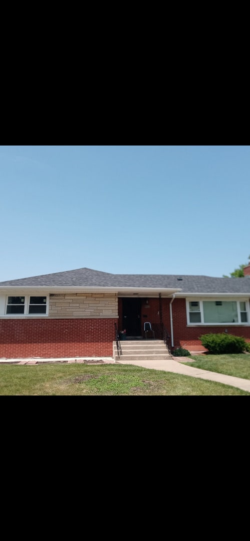 16265 Drexel Ave, South Holland, IL 60473 - ranch-style home featuring brick siding and a front yard