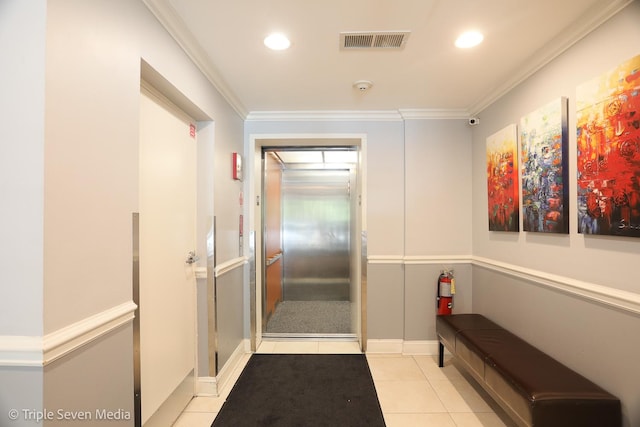1670 Mill St Unit 508, Des Plaines, IL 60016 - hall with elevator, light tile patterned floors, crown molding, and recessed lighting