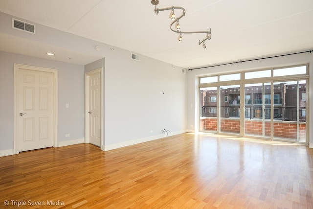 1670 Mill St Unit 508, Des Plaines, IL 60016 - unfurnished room featuring light wood-style flooring