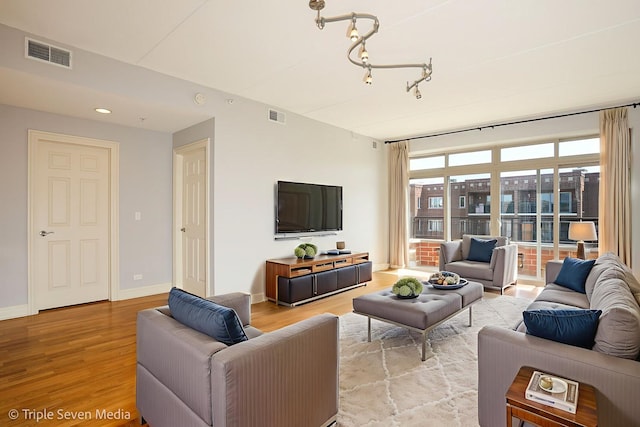 1670 Mill St Unit 508, Des Plaines, IL 60016 - living area featuring light wood finished floors and baseboards