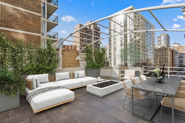 77 E Division St Unit 3, Chicago, IL 60610 - view of patio featuring an outdoor living space and a view of city