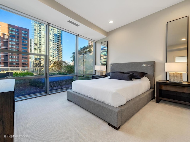 240 E Illinois St Unit 1002, Chicago, IL 60611 - bedroom with recessed lighting, carpet, and floor to ceiling windows