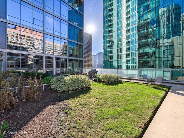 240 E Illinois St Unit 1002, Chicago, IL 60611 - view of community with a city view and a lawn