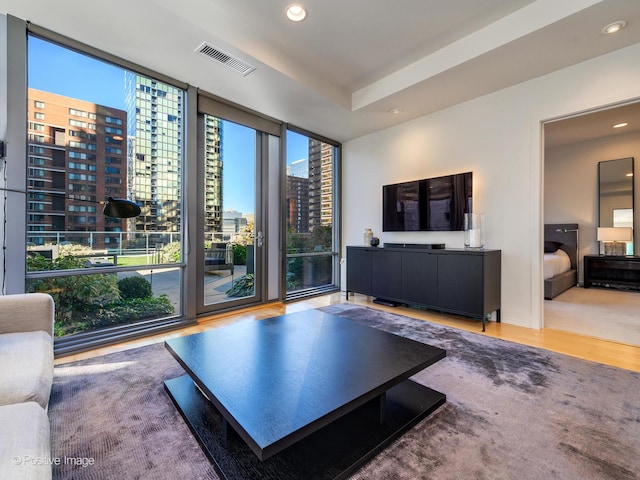 240 E Illinois St Unit 1002, Chicago, IL 60611 - living area featuring recessed lighting, wood finished floors, and floor to ceiling windows