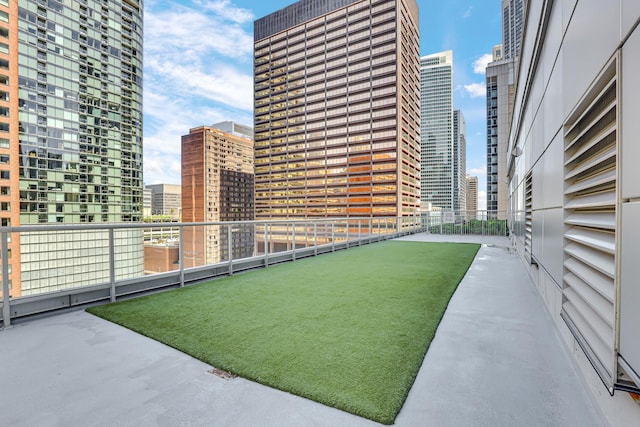 240 E Illinois St Unit 1002, Chicago, IL 60611 - view of yard with a city view and a balcony