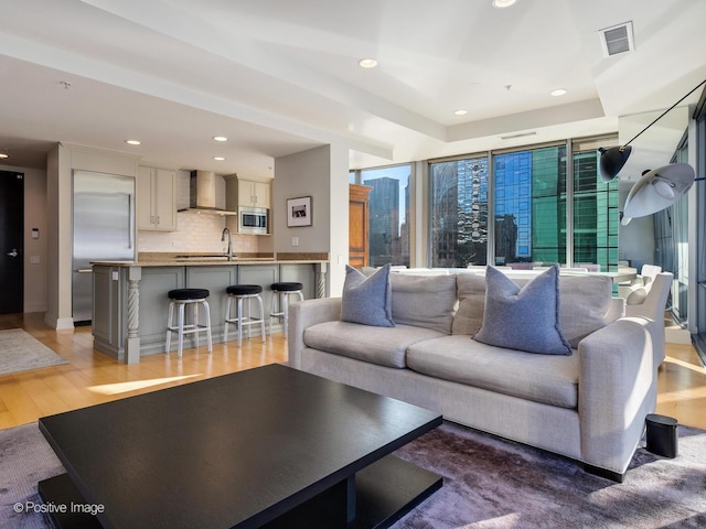 240 E Illinois St Unit 1002, Chicago, IL 60611 - living area with light wood-style floors and recessed lighting