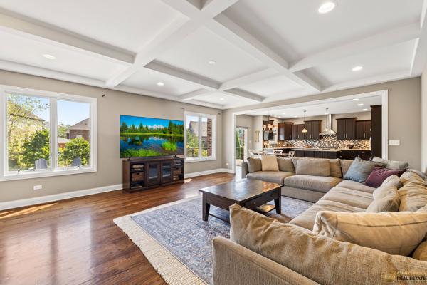 13119 Kinsale Ct, Lemont, IL 60439 - living room with dark wood-style floors, coffered ceiling, beamed ceiling, and recessed lighting