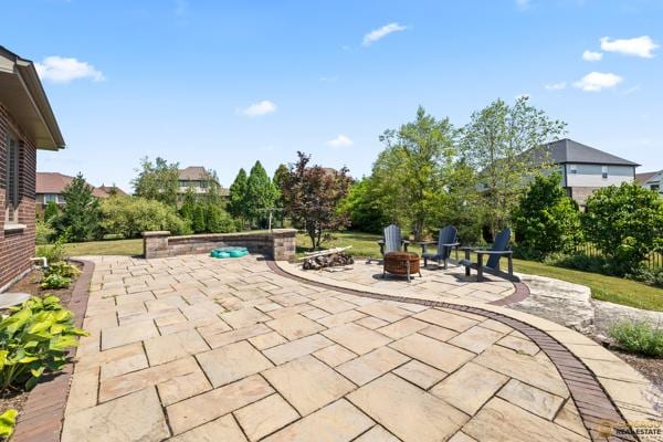 13119 Kinsale Ct, Lemont, IL 60439 - view of patio with an outdoor fire pit