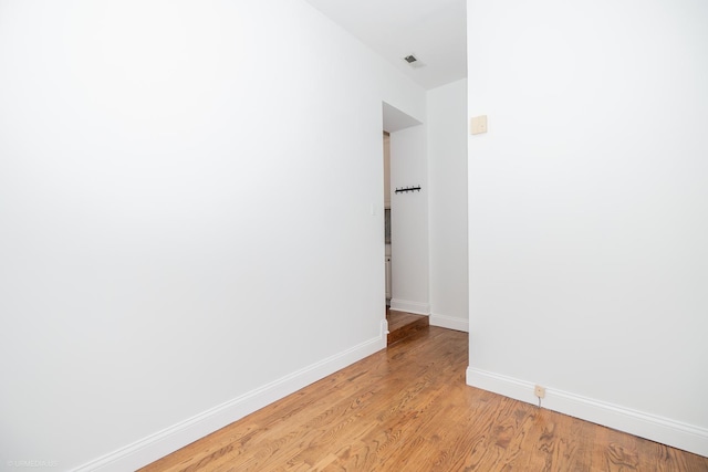 4536 N Sheridan Rd Unit 104, Chicago, IL 60640 - spare room featuring baseboards and light wood-style flooring