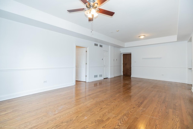 4536 N Sheridan Rd Unit 104, Chicago, IL 60640 - empty room with ceiling fan and light wood-style flooring