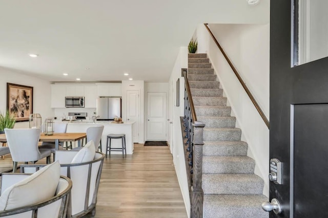 4944 Yates Dr Unit 0074, Mount Pleasant, WI 53403 - staircase with wood finished floors and recessed lighting