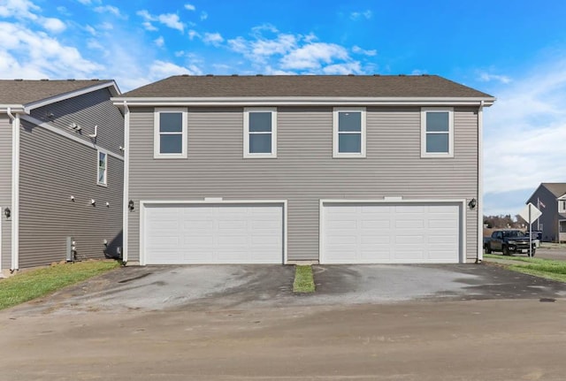 4944 Yates Dr Unit 0074, Mount Pleasant, WI 53403 - traditional-style home with a garage and asphalt driveway