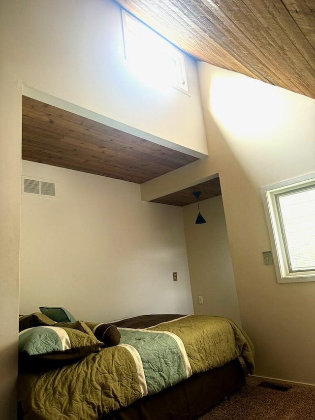 2303 Sumac Ct, Champaign, IL 61821 - carpeted bedroom with wood ceiling
