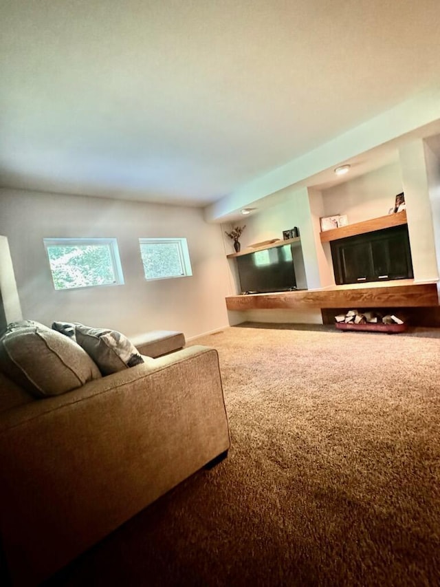 2303 Sumac Ct, Champaign, IL 61821 - living room with carpet flooring and a glass covered fireplace