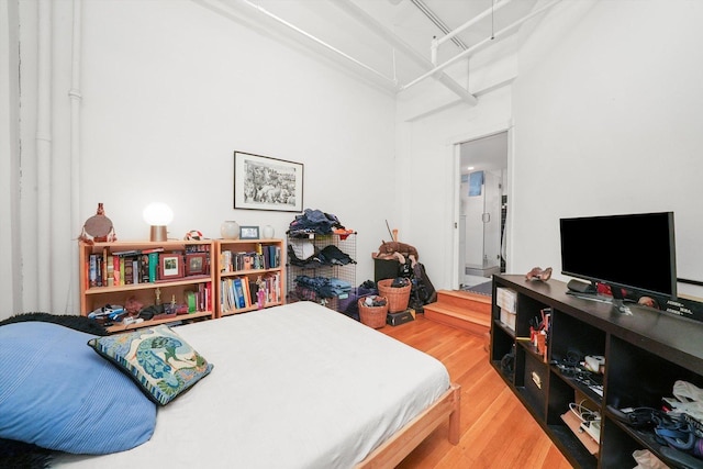 727 S Dearborn St Unit 311, Chicago, IL 60605 - bedroom featuring wood finished floors and a towering ceiling