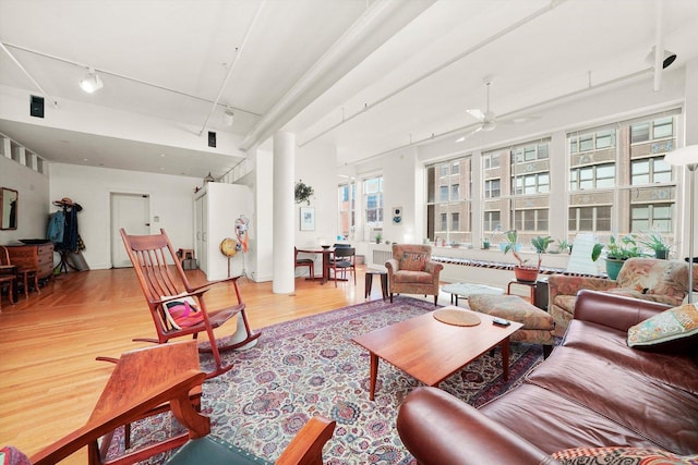 727 S Dearborn St Unit 311, Chicago, IL 60605 - living area with light wood-style flooring, ceiling fan, and rail lighting