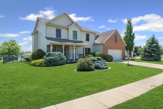 3220 Weeping Cherry Dr, Champaign, IL 61822 - traditional-style home featuring concrete driveway, stone siding, a porch, and a garage