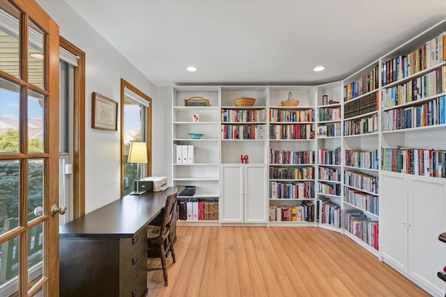 3220 Weeping Cherry Dr, Champaign, IL 61822 - office space with wood finished floors, plenty of natural light, recessed lighting, and bookshelves
