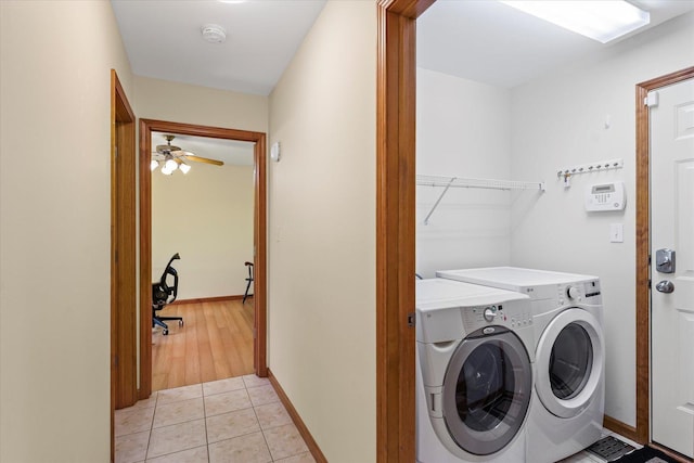 3220 Weeping Cherry Dr, Champaign, IL 61822 - laundry room with washer and clothes dryer, ceiling fan, and light tile patterned floors