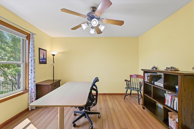 3220 Weeping Cherry Dr, Champaign, IL 61822 - office area with wood finished floors and ceiling fan