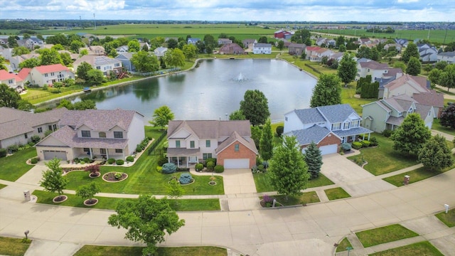 3220 Weeping Cherry Dr, Champaign, IL 61822 - aerial perspective of suburban area with a nearby body of water