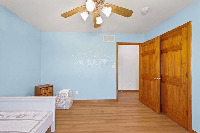 3220 Weeping Cherry Dr, Champaign, IL 61822 - bedroom featuring light wood-style flooring and a ceiling fan