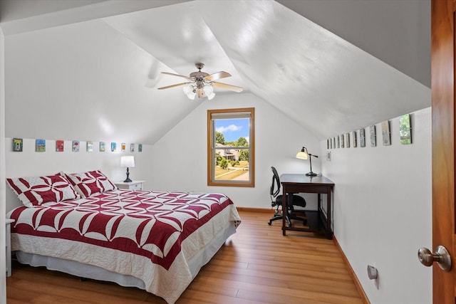 3220 Weeping Cherry Dr, Champaign, IL 61822 - bedroom with wood finished floors, vaulted ceiling, and ceiling fan