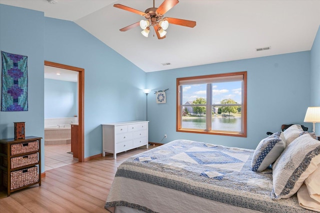 3220 Weeping Cherry Dr, Champaign, IL 61822 - bedroom with vaulted ceiling, light wood finished floors, ensuite bathroom, and a ceiling fan