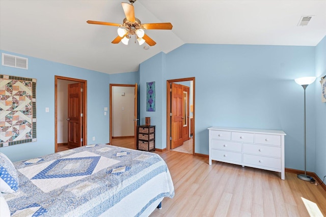 3220 Weeping Cherry Dr, Champaign, IL 61822 - bedroom with light wood-style flooring, vaulted ceiling, and ceiling fan