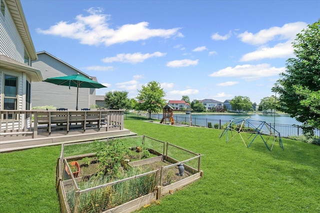 3220 Weeping Cherry Dr, Champaign, IL 61822 - view of yard with a water view, a playground, and a garden