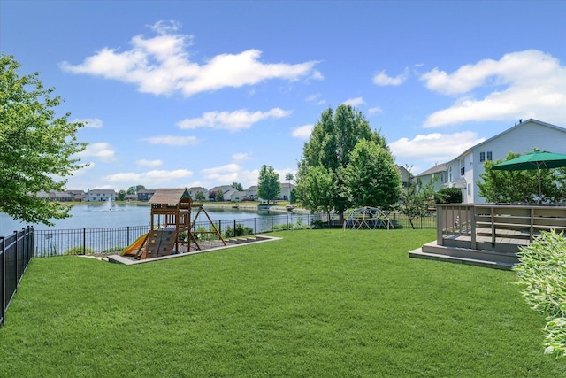 3220 Weeping Cherry Dr, Champaign, IL 61822 - fenced backyard with a playground, a water view, and a residential view