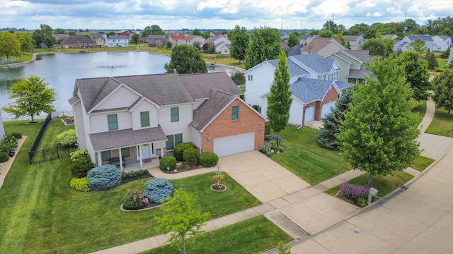 3220 Weeping Cherry Dr, Champaign, IL 61822 - aerial perspective of suburban area with a large body of water