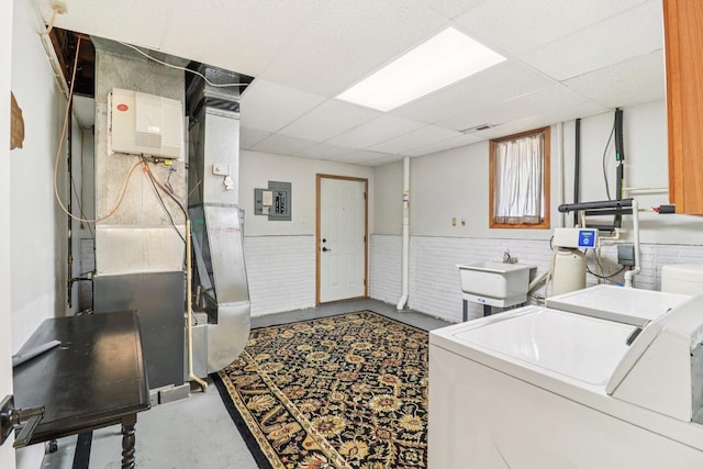 2642 N 3739th Rd, Sheridan, IL 60551 - laundry room with independent washer and dryer, wainscoting, heating unit, and electric panel