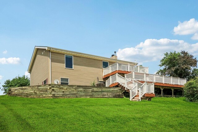 2642 N 3739th Rd, Sheridan, IL 60551 - back of house with a deck, a lawn, and stairs