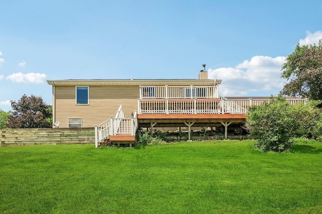 2642 N 3739th Rd, Sheridan, IL 60551 - back of house with a lawn, a deck, and a chimney