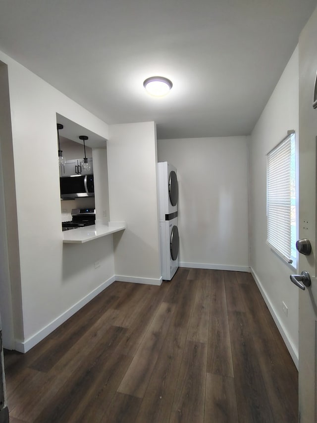 1623 S 58th Ct, Cicero, IL 60804 - laundry area featuring estacked washer and dryer and dark wood-type flooring