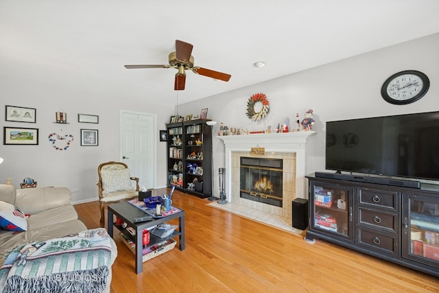 109 N Wilke Rd, Palatine, IL 60074 - living area with a ceiling fan, a fireplace, and wood finished floors