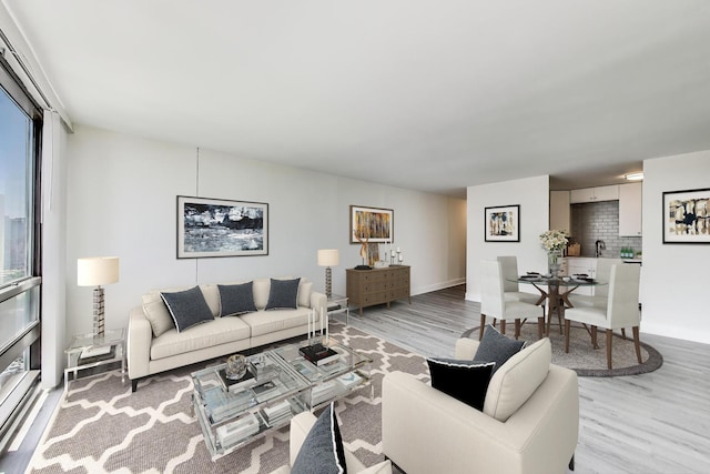 1636 N Wells St Unit 3007, Chicago, IL 60614 - living room with light wood-type flooring and baseboards