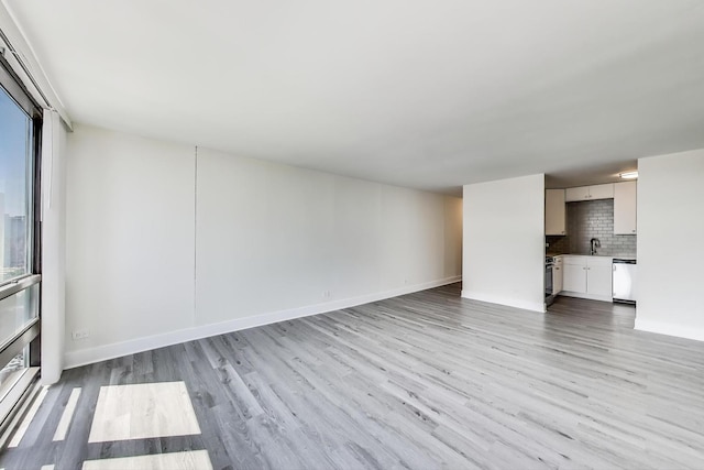 1636 N Wells St Unit 3007, Chicago, IL 60614 - unfurnished living room with light wood-style floors