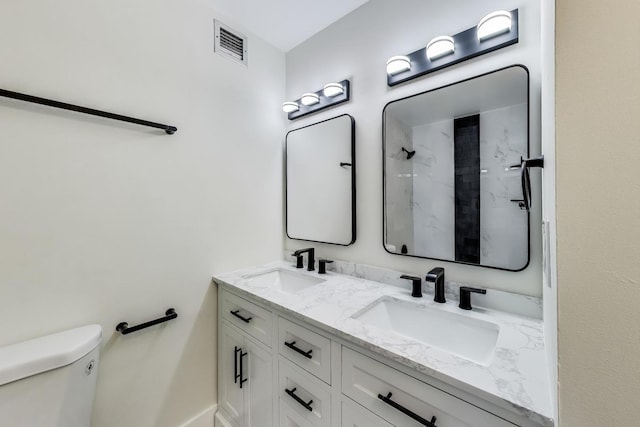 1636 N Wells St Unit 3007, Chicago, IL 60614 - bathroom with double vanity and a marble finish shower