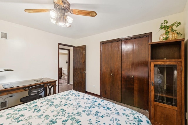 13115 Maple Rd, Mokena, IL 60448 - bedroom with a closet, ceiling fan, and wood finished floors