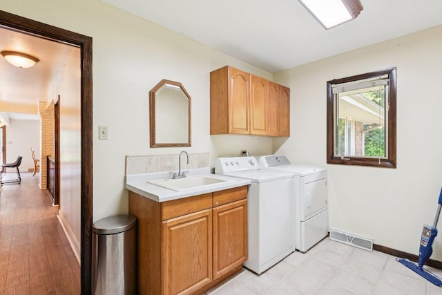 13115 Maple Rd, Mokena, IL 60448 - laundry room with independent washer and dryer and cabinet space