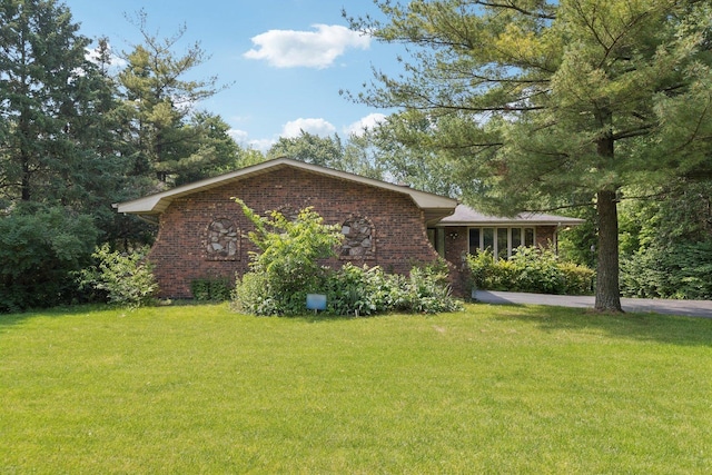 13115 Maple Rd, Mokena, IL 60448 - view of side of home with brick siding and a yard
