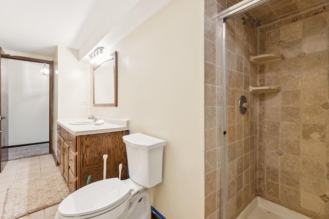 13115 Maple Rd, Mokena, IL 60448 - bathroom featuring vanity, a tile shower, and tile patterned flooring