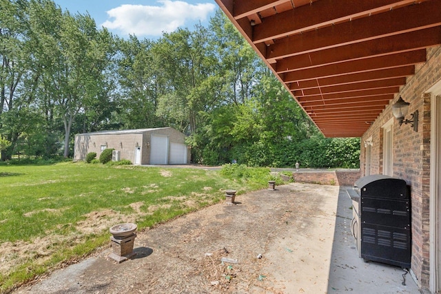 13115 Maple Rd, Mokena, IL 60448 - view of green lawn with a garage, an outdoor structure, and view of wooded area